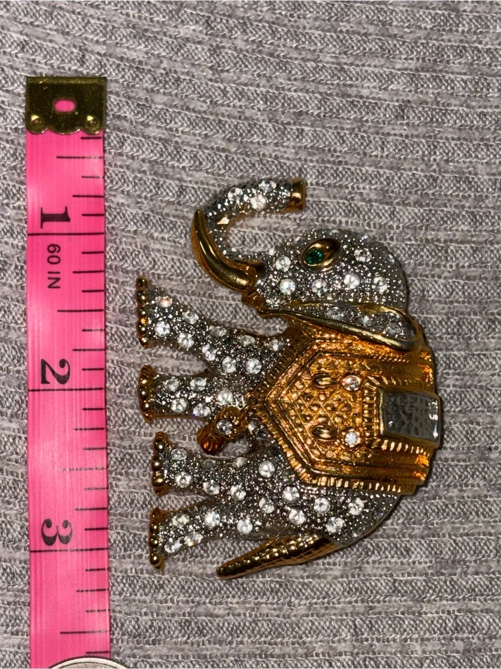 Vintage gold tone clear rhinestone encrusted elephant brooch w green rhinestone